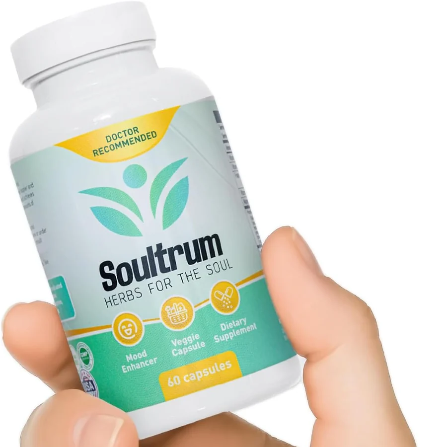 A hand holding the Soultrum daily mood support bottle